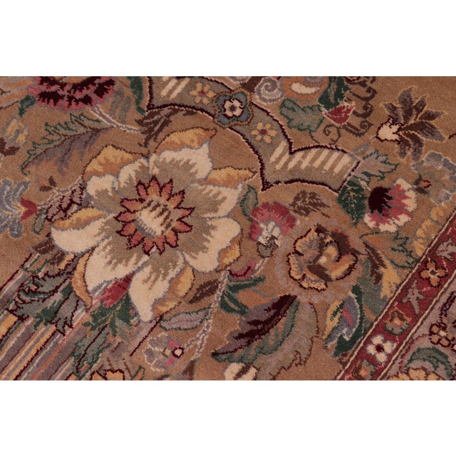 Designed with mesmerizing intricacy and gorgeous color palette, this hand-knotted masterpiece demonstrates the beauty and...