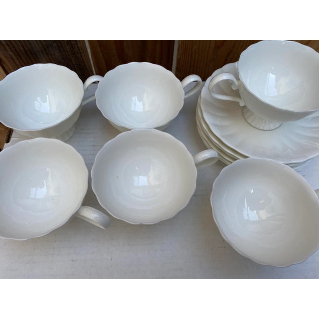 Vintage set of scalloped cups and saucers. Suitable for everyday use or elegant entertaining.