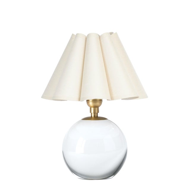 The Giorgio Mini Table Lamp provides a soft, inviting glow through its oyster scalloped shade, making it a perfect accent...