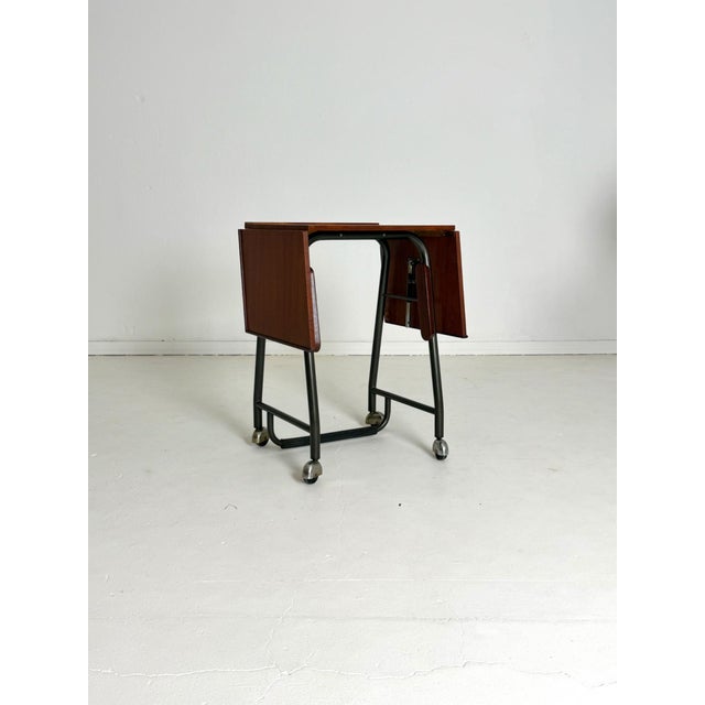 Danish Typewriter Table, 1960s–70s A playful and functional Danish typewriter table from the 1960s–70s. Compact in size...