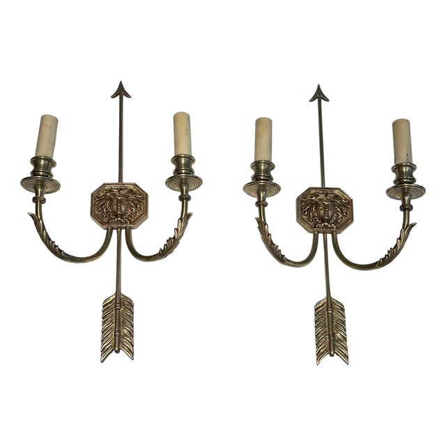1950s bronze wall sconces with Arrows and Effigy of the Sun King by Louis Gau - a Pair For Sale