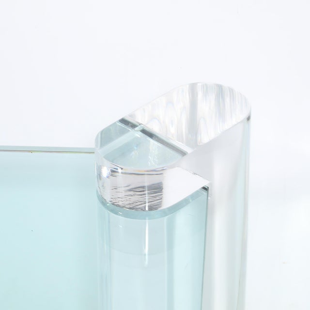 This elegant Mid-Century Lucite Bullet-Form Supports &amp; Glass Coffee Table by Karl Springer originated in the United...