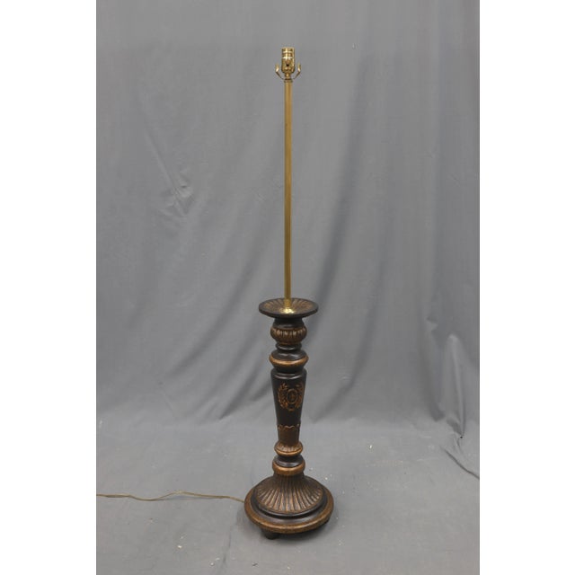 Floor lamp post, wood base painted with a bronze color paint and black.