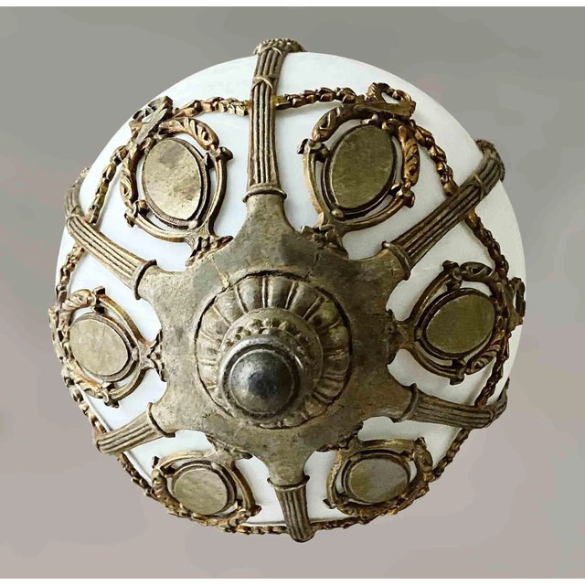 Antique, early 20th century Renaissance style bronze pendant light with columns, festoons and garland. Opalescent glass...