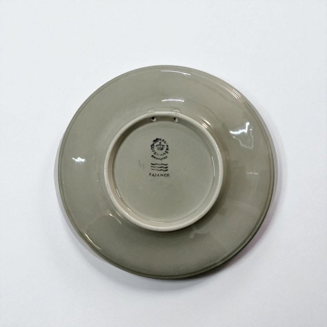 Small commemorative faience plate produced by royal copenhagen for the danish navy (søværnet) in 1972. the plate features...
