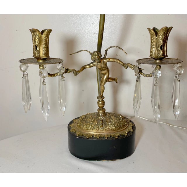 Up for sale is a high quality pair of antique Victorian style bronze and wooden figural table lamps. They feature...