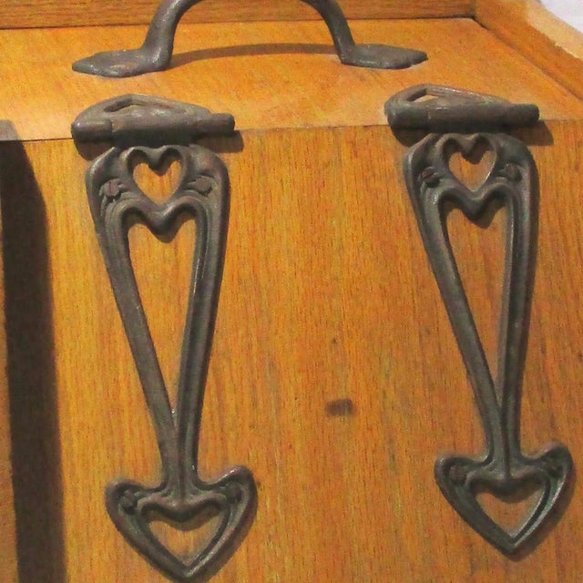 Antique oak coal scuttle. High-style housing with no liner for actual coal chunks. Art Nouveau period case for the...