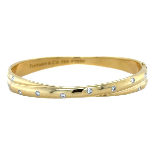 Late 20th Century Tiffany & Co. Etoile Yellow Gold, Platinum and Diamond Bangle Bracelet For Sale