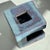 This Blue Artisan Ceramic Sculpture "Ball Cubed"is in New condition.. Measures 5 1/2 x 5 1/2" and weighs 6 pounds. Signed...