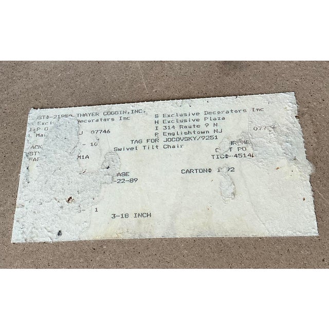 Embrace the pinnacle of American postmodern luxury with this exquisite pair of swivel rocker lounge chairs by the...