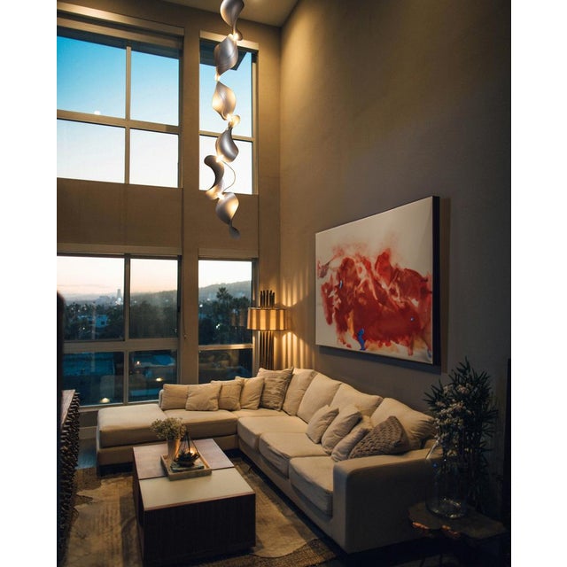 The wide, undulating curves of large sand dunes inspired us to create the modular Dune light fixture. Fascinated by the...