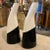 A pair of black and white ceramic vases made in Italy by La Donatella in the Sixties, they are in very good conditions and...