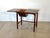 1950s writing table, oak and walnut wood, dimensions open width 107.5 cm.