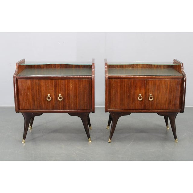 This refined pair of Mid Century Modern bedside tables was produced in Italy in the 1950s and exemplifies the elegance and...