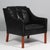 Børge Mogensen lounge chair original upholstered with black leather. Legs of mahogany. Model 2207, made by Fredericia...