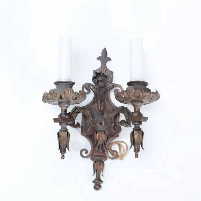 A Pair of Antique wrought iron floral sconces. Circa 1920.
