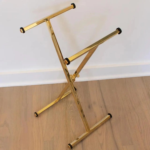 Elegant Mid-Century-Modern barware folding tray table designed and manufactured by Maison Mercier, Paris, in the 1960s....