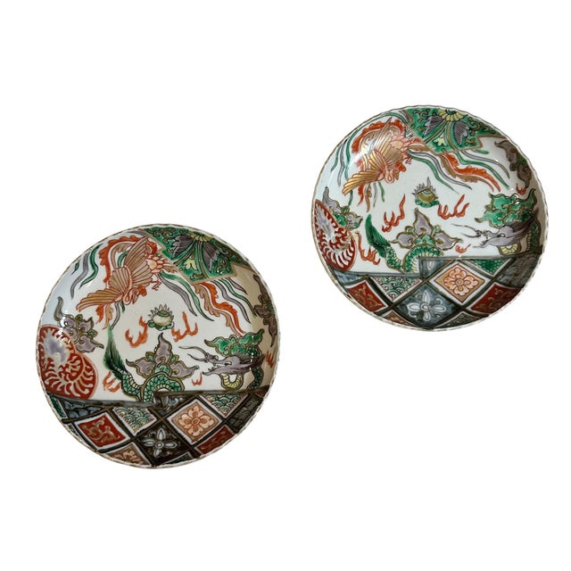 A pair of turn of the century Japanese Imari small plates with a small scalloped edge. From a very large collection of Imari.