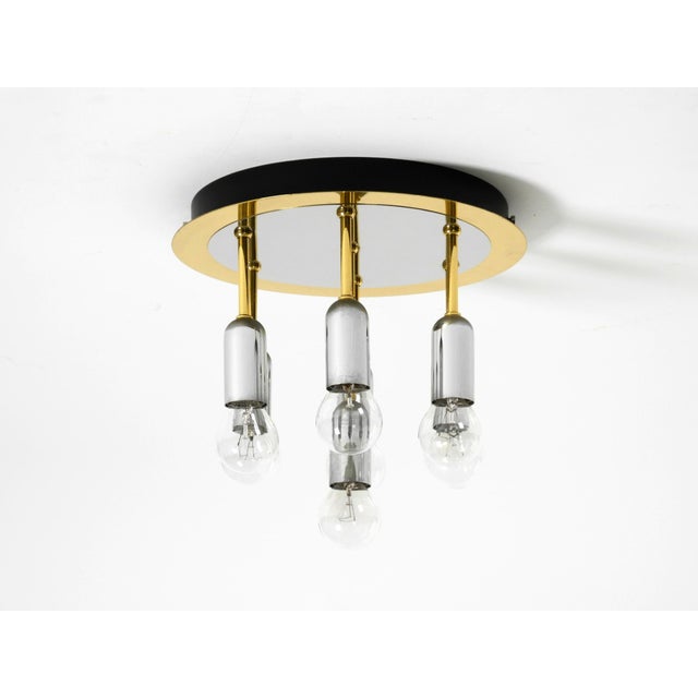 Original 1980s two-tone ceiling lamp by h. Schmidt leuchtenfabrik. the lamp is crafted from brass and chrome. features a...