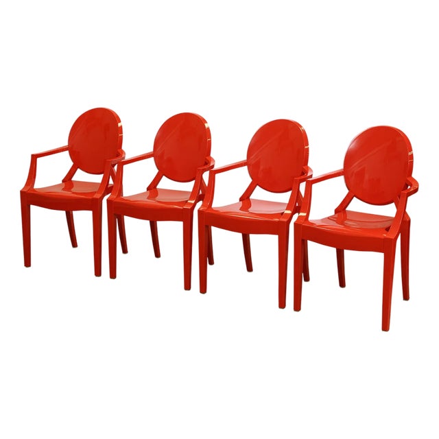 Late 20th Century Set of Four Philippe Starck Style Red Molded Plastic Armchairs For Sale