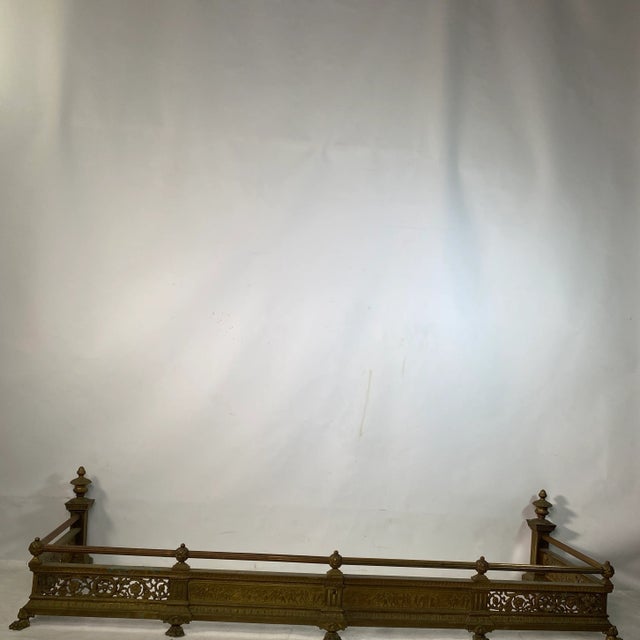 Antique Grecian Scened fender which is in good shape with reinforced cast iron front.The front brass is Scened also floral...