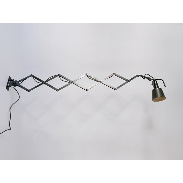 Huge, articulated bauhaus scissor wall lamp. Adjustable and extendable arm. Lamp shade adjustable in every position....