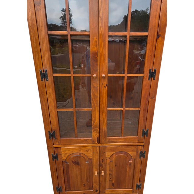 Beautiful Ethan Allen cabinet in excellent condition minor age-related ware common with this knotty pine collection. there...