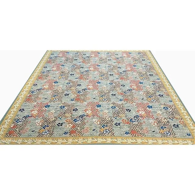 ACTUAL SIZE: 9’0″ x 12’0″ PRIMARY COLOR: Blue / Pink AGE: New ORIGIN: China MATERIALS: Wool FOUNDATION: Cotton PRODUCTION:...
