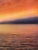 Afterburn by Brian Sostrom | Acrylic on panel of a sunset over a calm lake and clouds. For Sale - Image 4 of 5