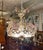 Incredible 6-light midcentury French chandelier in the style of Maison Baguès. Wonderfully colored glass petals and leaves...
