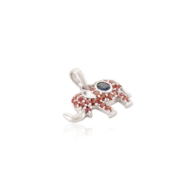 This is part of Chairish’s Fine Jewelry assortment. This modern 14K solid white gold pendant features a charming elephant...