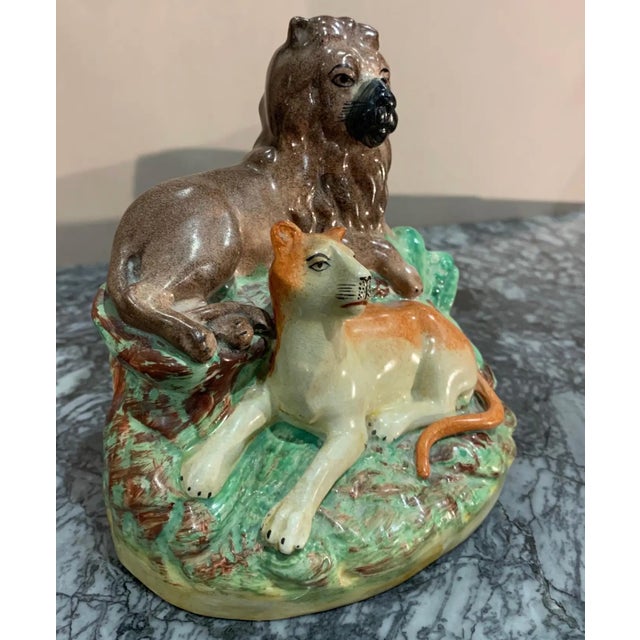 Late 19th-century Staffordshire lions.