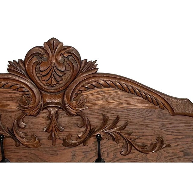 This wall hung hat and coat rack dates from the mid to late 1800s. It is constructed of oak and features hand-carved...