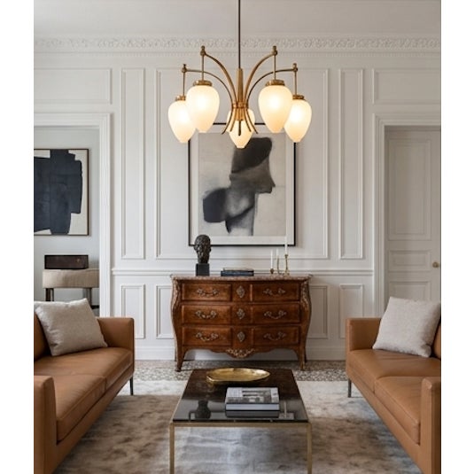 A refined and sculptural five-arm Stilnovo chandelier crafted in warm-toned brass, featuring gracefully curved arms that...