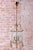 This elegant chandelier represents a refined blend of the modern Art Deco style and the traditional Gustavian style,...