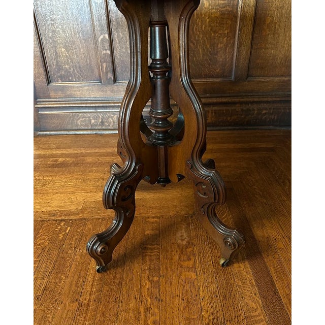 Brown Late 19th Century Victorian Rococo Style Carved Walnut Oval Rolling Parlor/Side/Center Table For Sale - Image 8 of 9