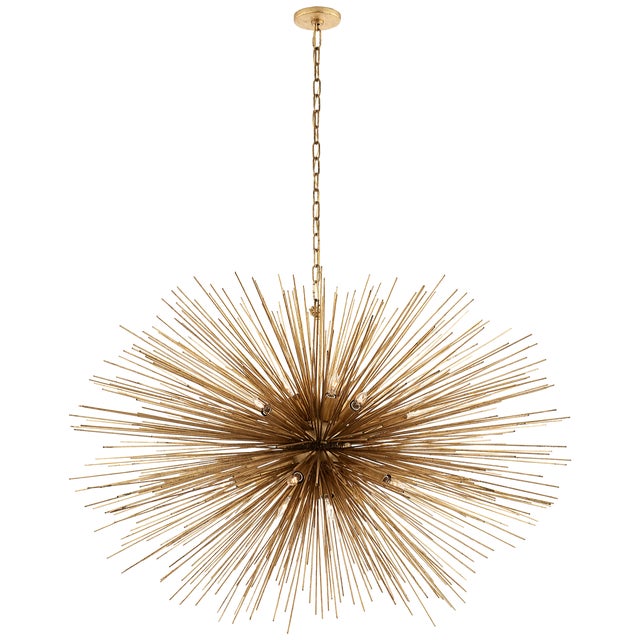 Strada Large Oval Chandelier in Gild Designer: Kelly Wearstler Canopy: 4.75" Round Mounting: Chain Shade Detail: No Option...