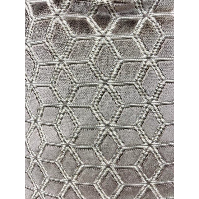 Custom pair of 22” pillows covered in a luxe cut velvet fabric in a cube pattern. These pillows have tapered corners to...