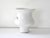 A minimalist, organic modern white glaze over white porcelain studio art pottery vase or vessel, hand-thrown, with slip...