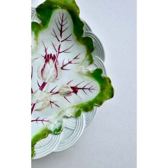Mid 18th Century Chelsea porcelain trompe l’oeil leaf dish decorated with a naturalistic study of radishes. The underside...