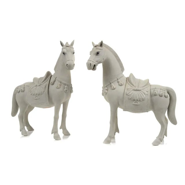 Chinese Rare Bisque Porcelain Horse Figurines - A pair c.1920s. Size 9 x 10". A beautiful piece that will add to your décor!