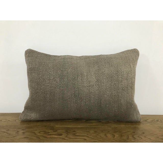 This is a vintage Turkish Anatolian kilim rug from the 1960s. The piece was hand-woven. Just cover no insert