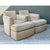 This pair of vintage Donghia swivel lounge chairs with matching ottomans exemplifies the brand's celebrated commitment to...