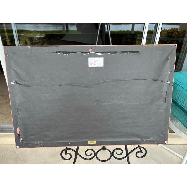 This 39” x 25” Jane F. Lux framed watercolor painting featuring yellow lilies with green leaves. The painting is delicate...