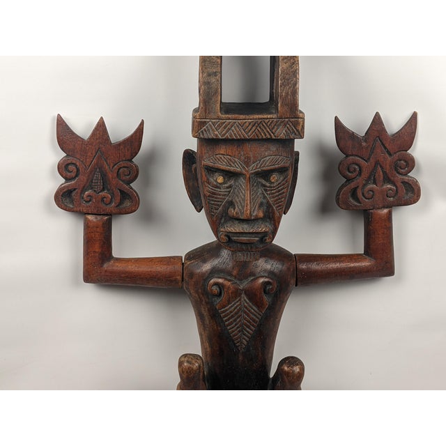 Striking large-scale carved wood ancestor figure attributed to the Nias cultural tradition of Indonesia and consistent...