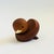 A mid century turned wood figurine in the shape of a Mandarin Duck. Adorable stylized features. Made in Japan by Senshukai...
