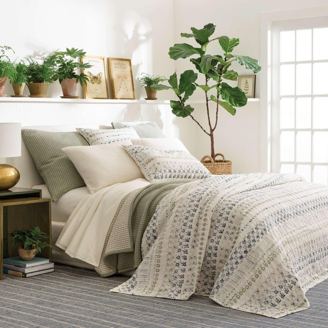 Precisely crafted Forest Green pick stitch accentuates the yarn dyed cotton jacquard of this reversible Evergreen...