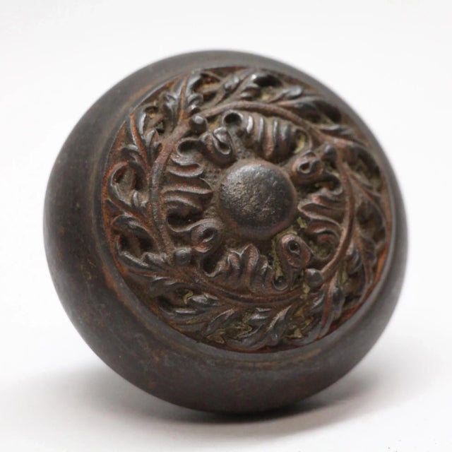 This Romanesque style cast iron swirl designed door knob was made by Russell & Erwin in the 1905 catalog. It is part of...