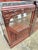 Art Deco buffet dating from around 1930, trapezoidal in shape, in a rosewood stained mahogany, richly molded and carved...