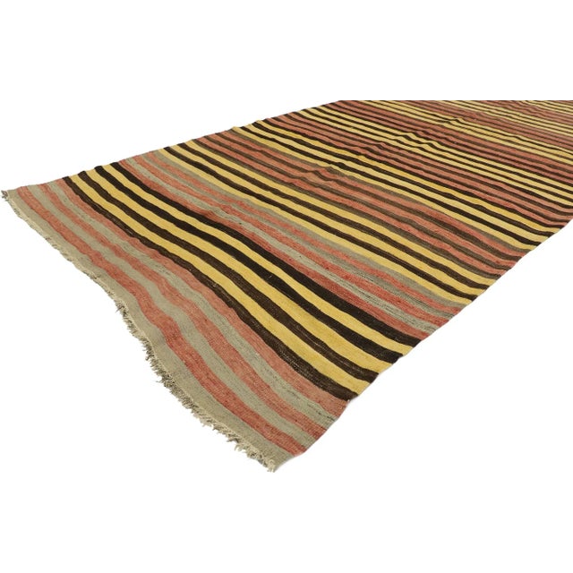 Vintage Turkish Striped Kilim Rug with Mid-Century Modern Style 04'06 x 11'06. With its warm hues and rugged beauty, this...